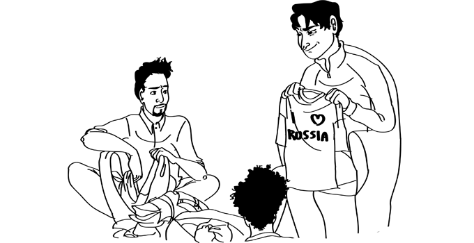 Denis holding up a shirt that reads I love Russia while Tony and Josh seem to be unpacking